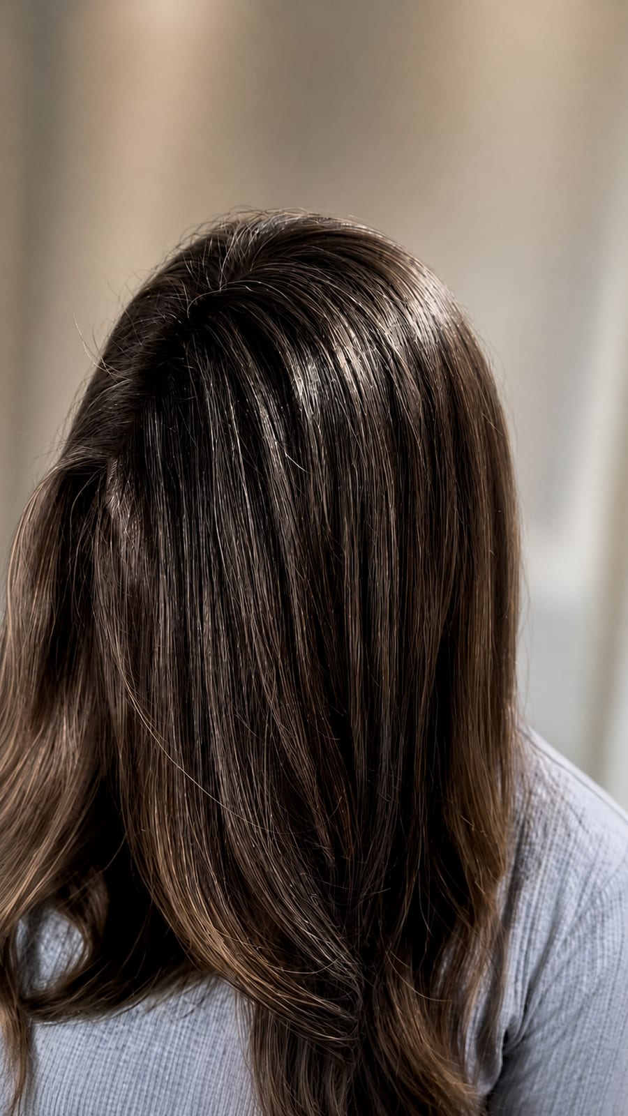 A finished dark-brown grey blend with subtle dimensional lights